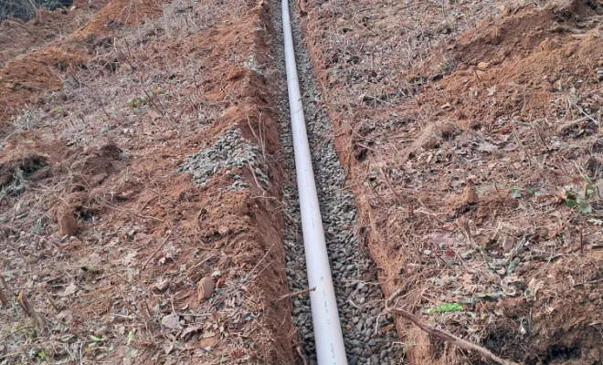 Pose de 4 drains d'infiltration.