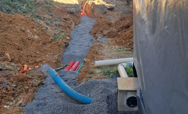 Pose des gaines et du tube pour l'eau potable.